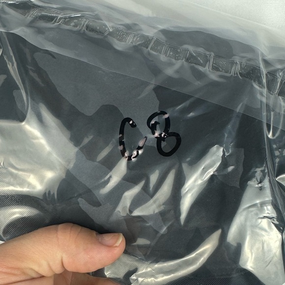 Athleta Mesh Run Racer 4" athletic shorts. Women's size medium. Black camo. - Picture 6 of 6